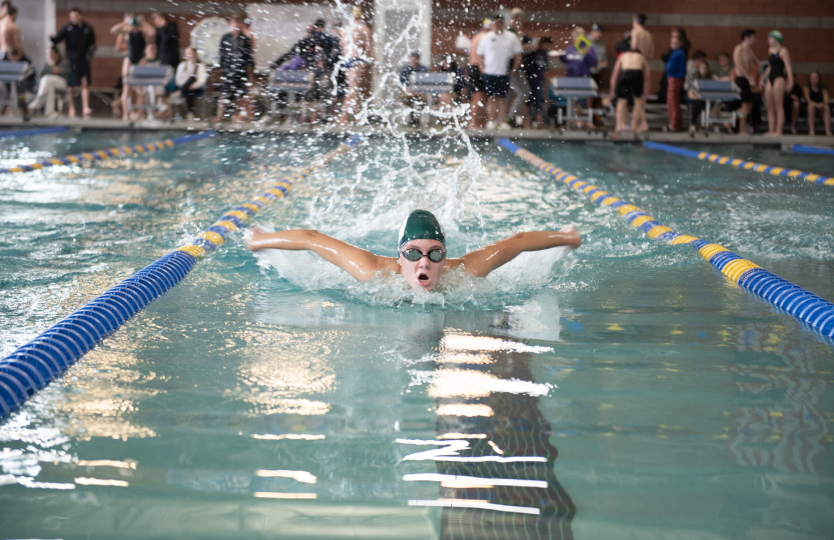 1.31.25 Junior Lucy Baker swimming Butterfly in the 200 IM at the Butte. 